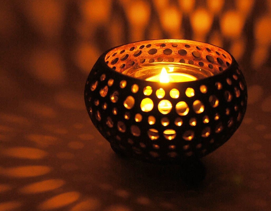 Exotic Elegance Glowing Perforated Pattern Candle Holder From Coconut Shell.